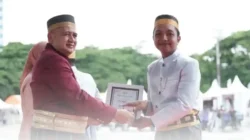 Kecamatan Tallo Hadiri Puncak HUT ke-418 Kota Makassar di Karebosi, Staf Kesra Raih Penghargaan Pegawai Teladan