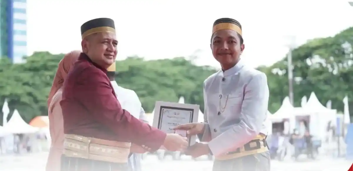 Kecamatan Tallo Hadiri Puncak HUT ke-418 Kota Makassar di Karebosi, Staf Kesra Raih Penghargaan Pegawai Teladan